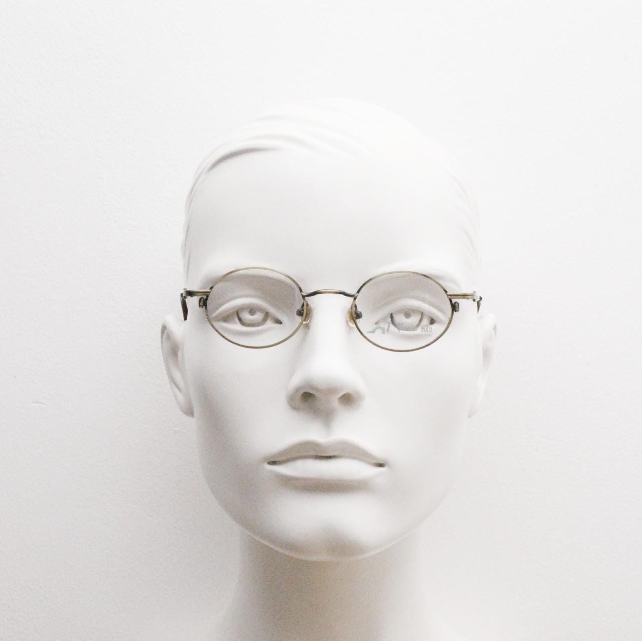 Paris Ma 90s vintage small oval eye glasses. Brushed bronze optical frames with charming details. Prescription NOS. Steampunk spectacles
