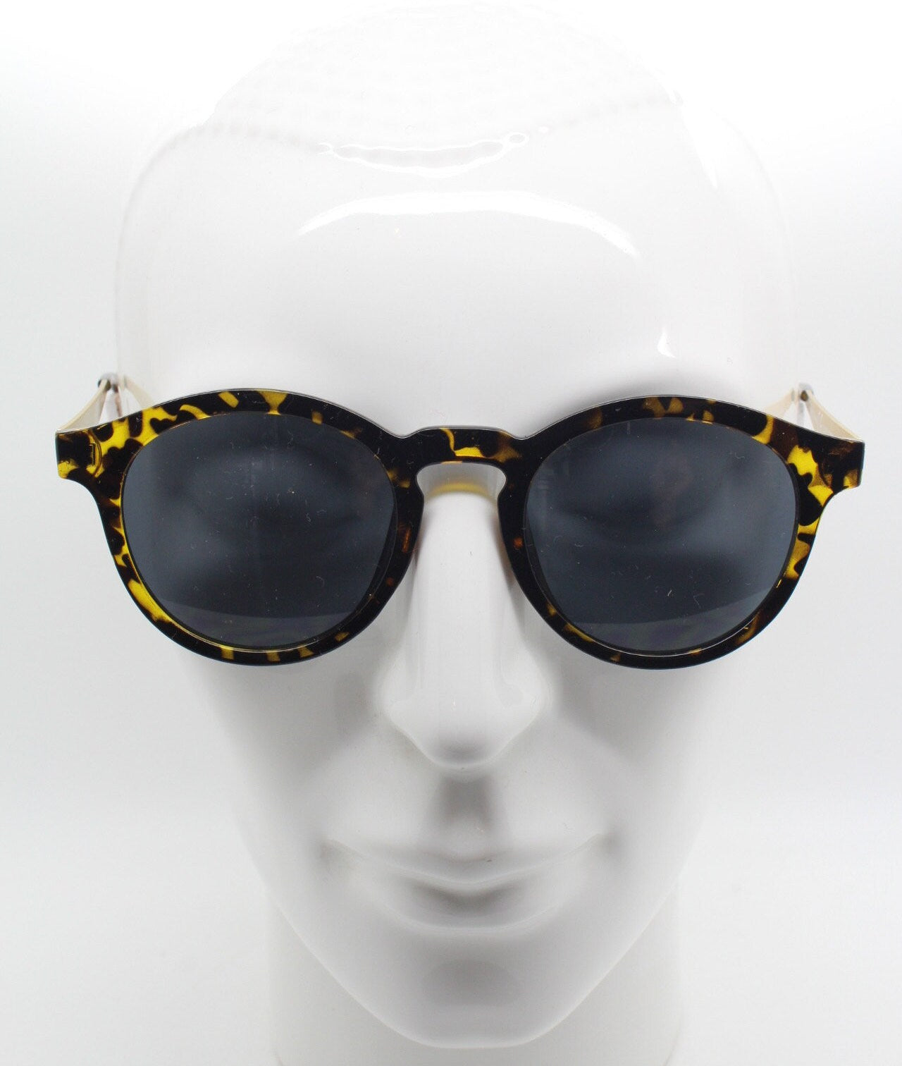 90s vintage round glasses. Tortoise 40s style frame with contrasting gold arms