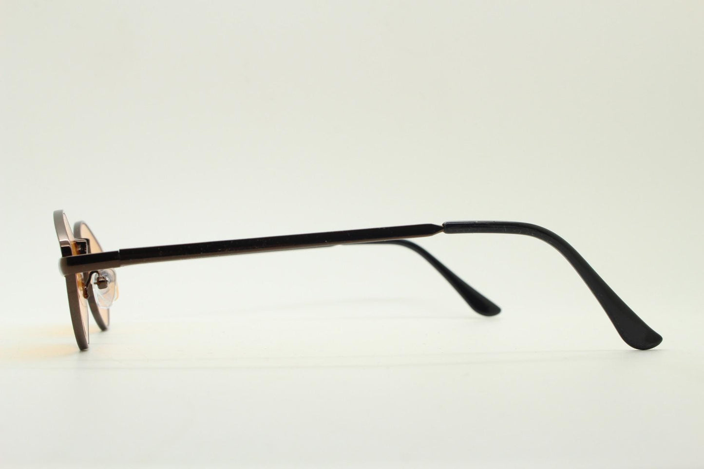 90s vintage pointed hexagon sunglasses. Minimal bronze brown psychedelic mod style frame with blazing orange lenses. Unused NOS