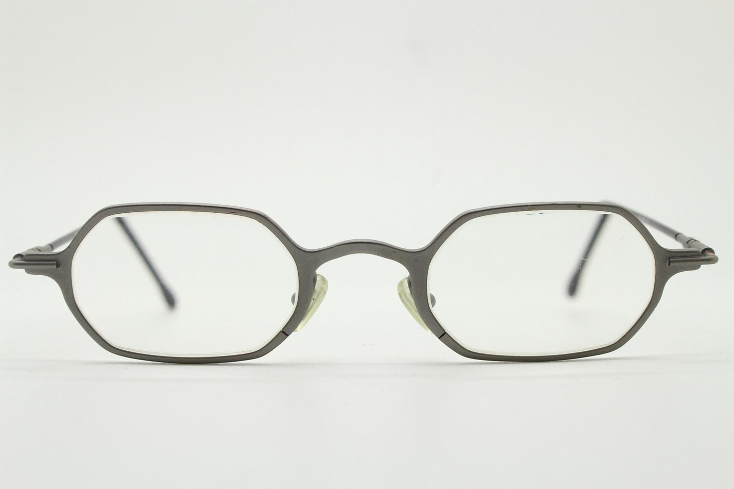 DKNY 90s vintage hexagon eye glasses made in Italy. Small matt grey optical frames. Prescription RX. Donna Karan. Victorian style steampunk