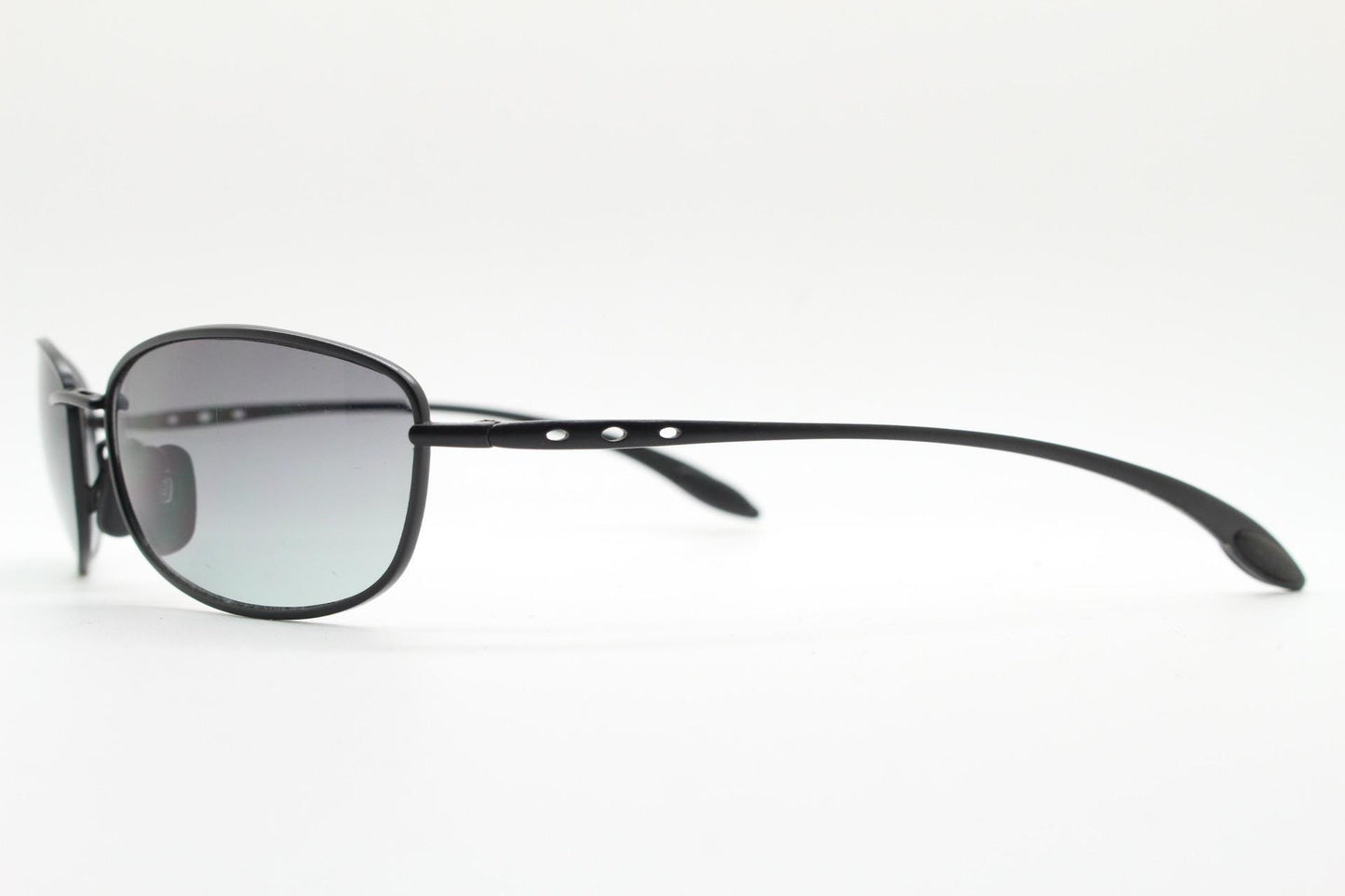 90s vintage curved rectangular sunglasses. Solid metal low profile black matt finish frame with slightly graduating lenses. 2000's. Y2K. NOS