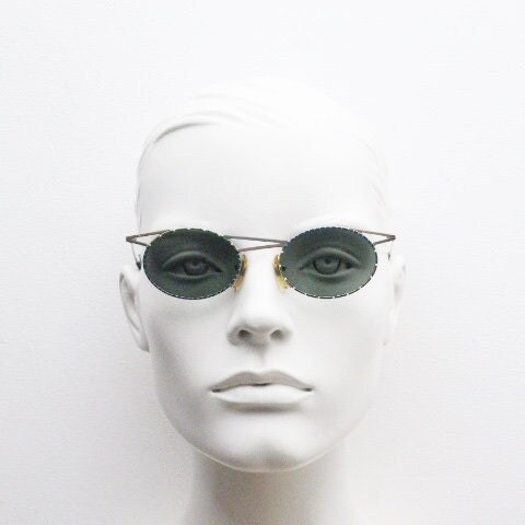Taxi 90s vintage oval sunglasses. Unique innovative abstract design with extraordinary multi colour print. Casanova