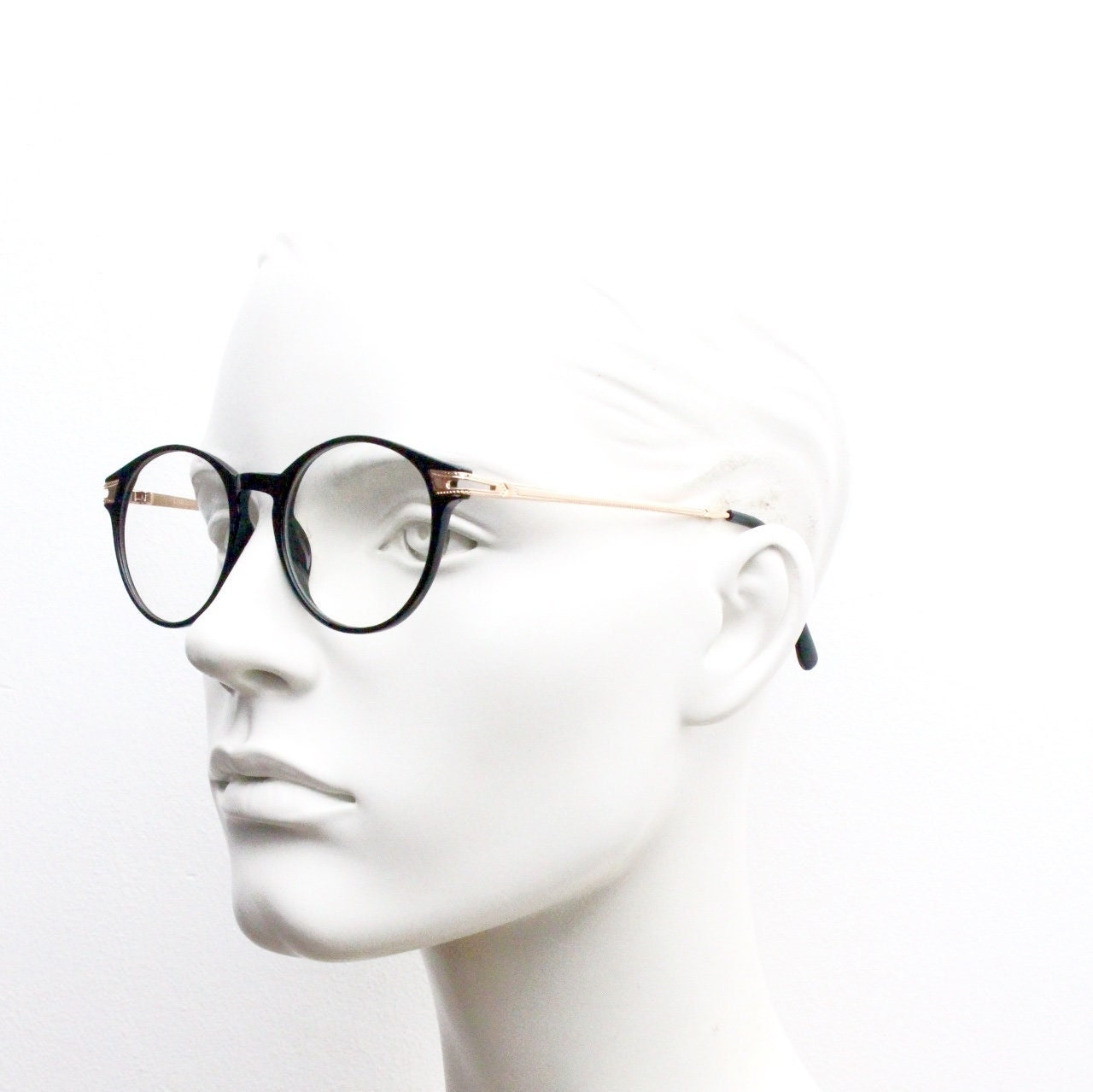 90s vintage round glasses with embossed gold  arms. Black 40s, 50s style prescription optical frames. Clear lens eyeglasses. RX spectacles
