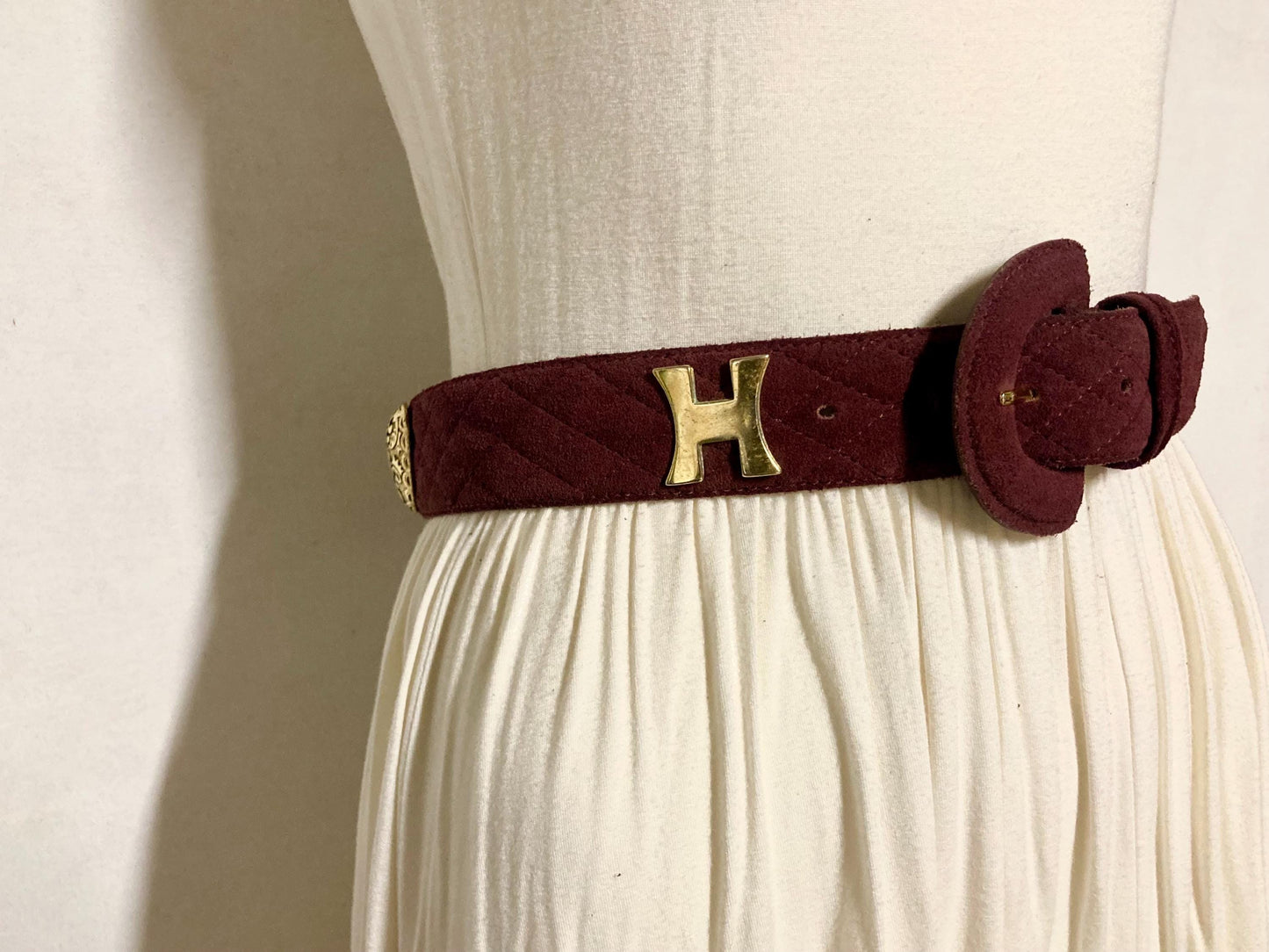 80s vintage womens dress belt in wine real suede with substantial covered buckle and gold domed hearts. Made in France by Chanon. NOS