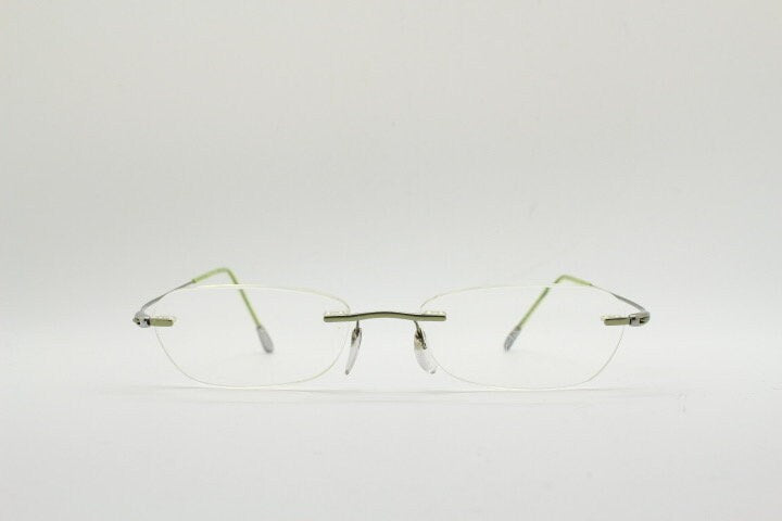 Silhouette rectangular frameless eye glasses made in Austria. Minimal lightweight optical frame with silver trim. Prescription RX