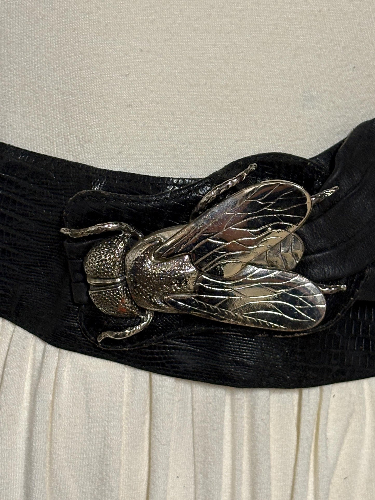 80s vintage womens black real leather dress belt with substantial dramatic big fly metal buckle. Womens sash. Statement feature belt