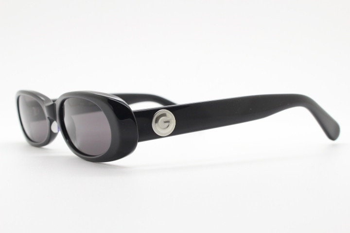Guess vintage 90s low profile oval sunglasses. All black gloss quality acetate finish. New Old Stock