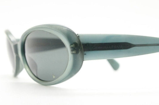 Giorgio Armani 90s vintage oval sunglasses made in Italy. Transparent grey\blue acetate frame with matching lenses. Small bug eye. Y2K