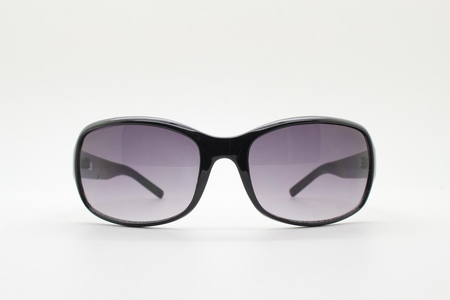Y2k vintage wrap around rectangular sunglasses. Curved black gloss frame with graduating grey lenses. 2000's bug eye. NOS