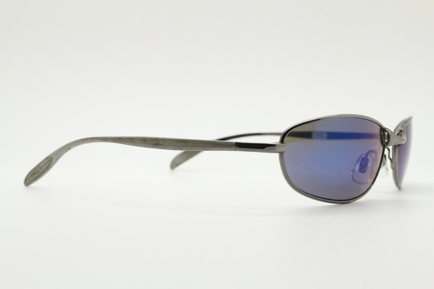 90s vintage oval small bug eye sunglasses. Curved grey chrome finish solid metal frame with blackout mirror lenses. Quality NOS