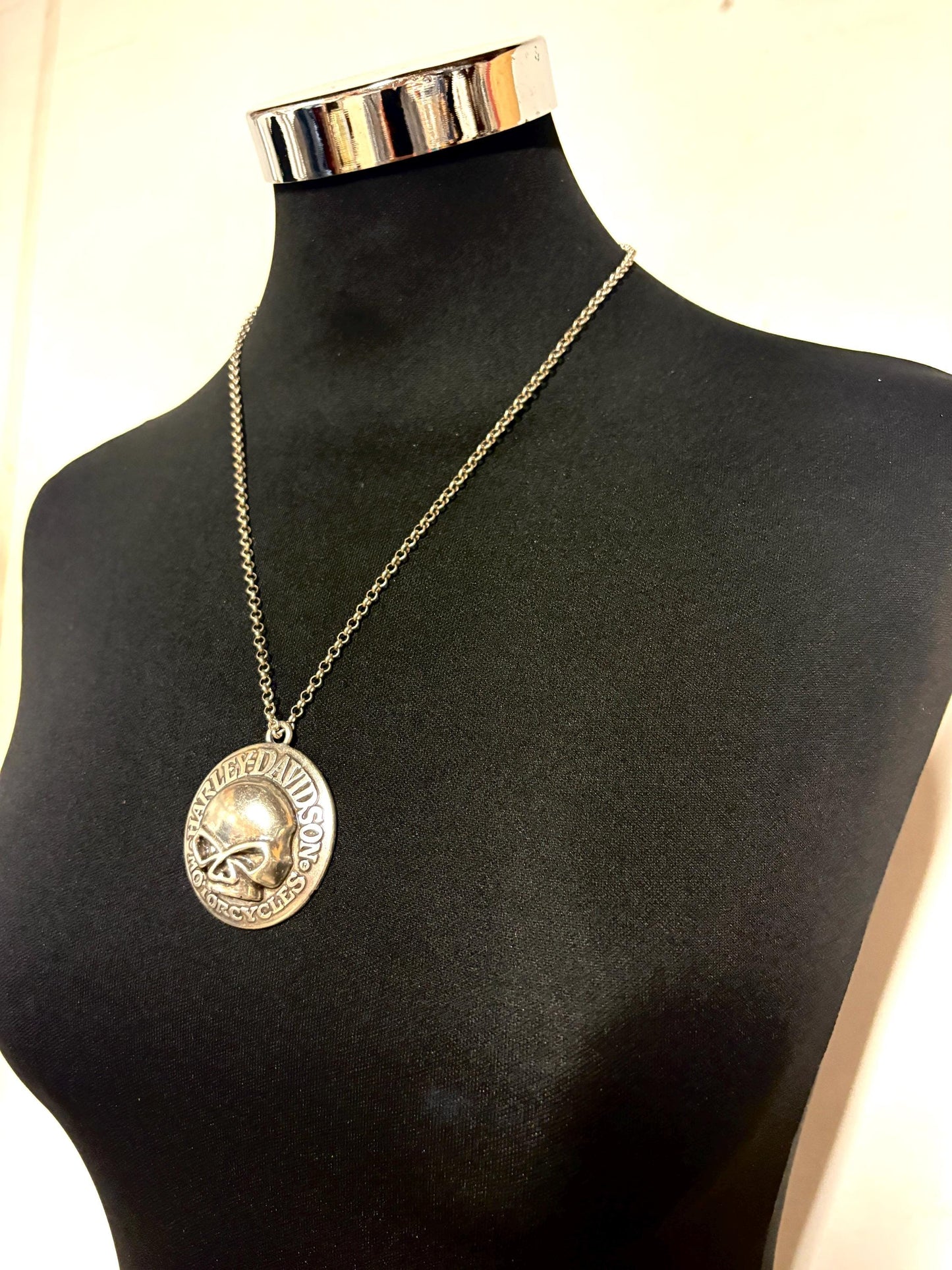 90s vintage Harley Davidson Motorcycles disc pendant necklace. Solid metal silver curved shield with standout skull on adjustable chain