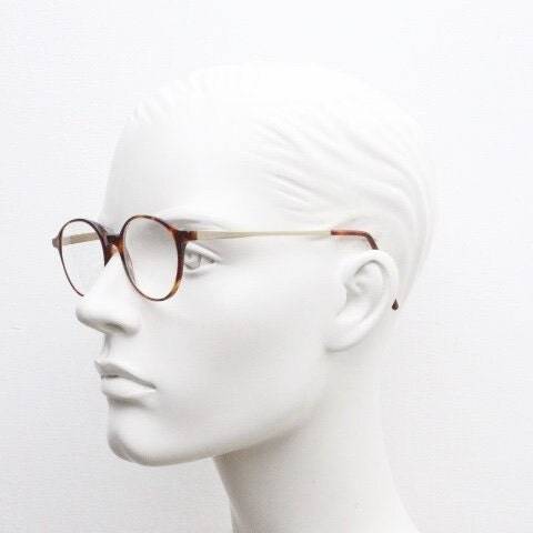 Moleskine round eye glasses in tortoise acetate with slim golden arms. Reading optical frames. Prescription eyeglasses. RX spectacles