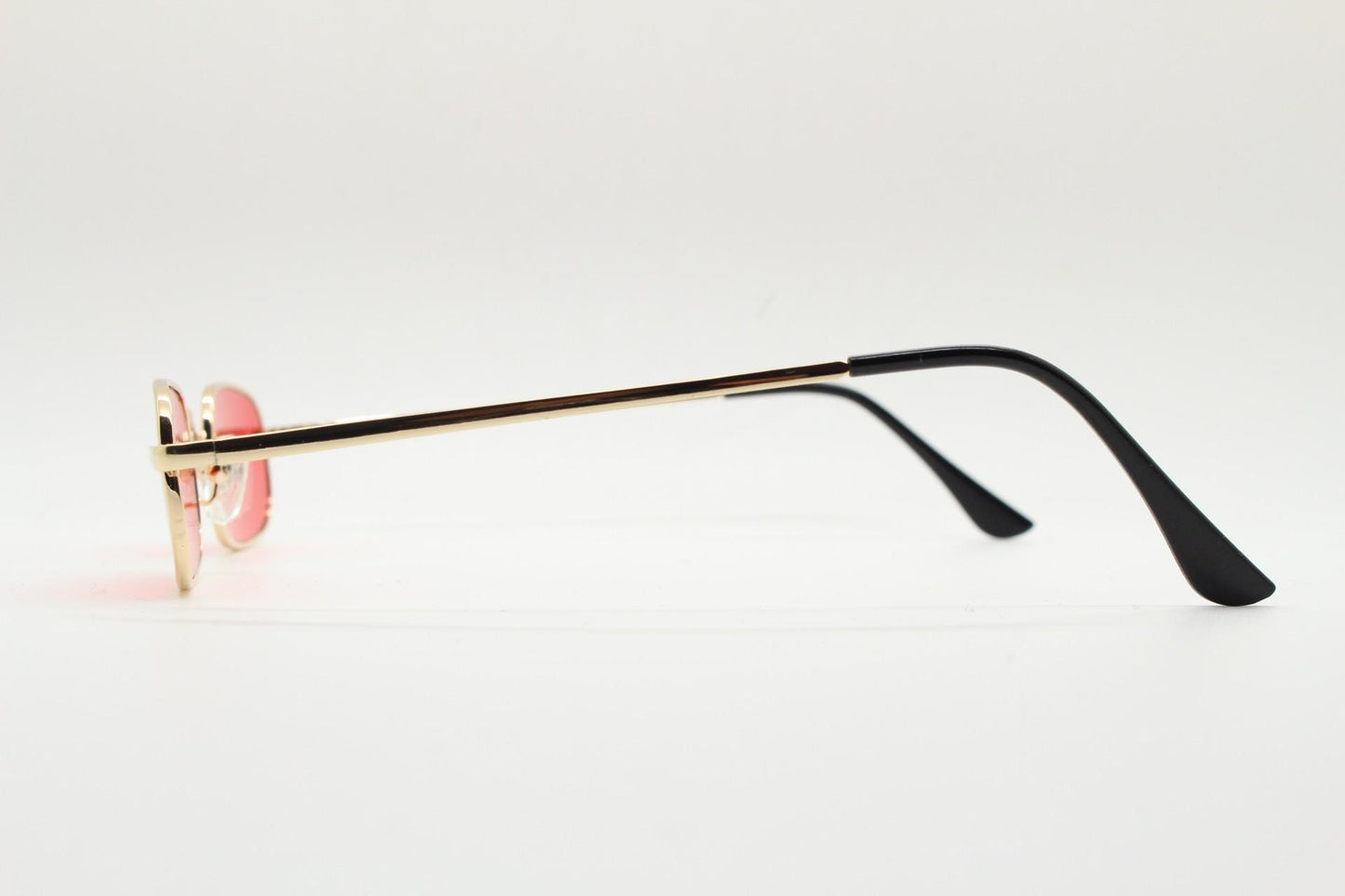 90s vintage small rectangular sunglasses. Imposing minimal gold metal victorian style frame with deep red lenses. Unused BNWT