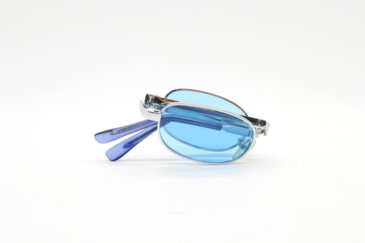 90s micro foldable oval sunglasses. Sky blue lenses in a small silver folding compact frame. Folder. Rave 2000s. Y2K. NOS
