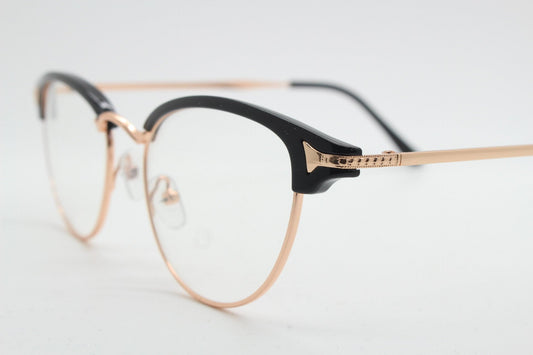 90s vintage browline cat eye glasses. Black gloss and gold half frame eyeglasses. 50s, 60s cateye design with clear lenses. NOS