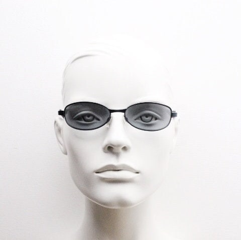 90s vintage oval small bug eye sunglasses. Curved grey satin finish solid metal frame. Rave. Steampunk. Unused NOS
