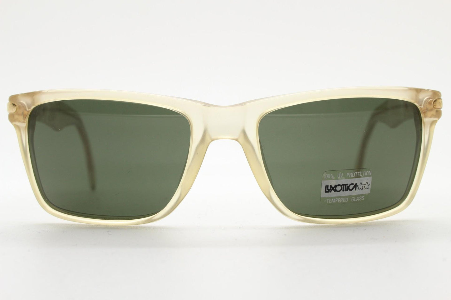 Luxottica 90s vintage rectangular sunglasses made in Italy. Transparent yellow acetate chunky frame with contrasting dark green lenses. BNWT