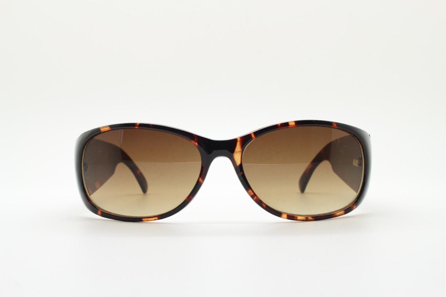 Y2k vintage wrap around bug eye sunglasses. Aerodynamic 60s design tortoise frame with full height arms in excellent proportions. 2000's NOS