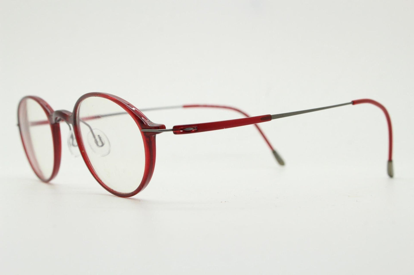 Silhouette rectangular frameless eye glasses made in Austria. Lightweight 1930s design with titanium. Red optical frame. Prescription RX