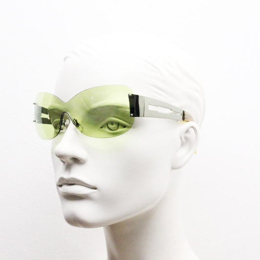 Y2K vintage frameless shield sunglasses. Dynamic 2000's green mono lens visor with matching coloured chrome arms. 00's Cosplay mini mask NOS