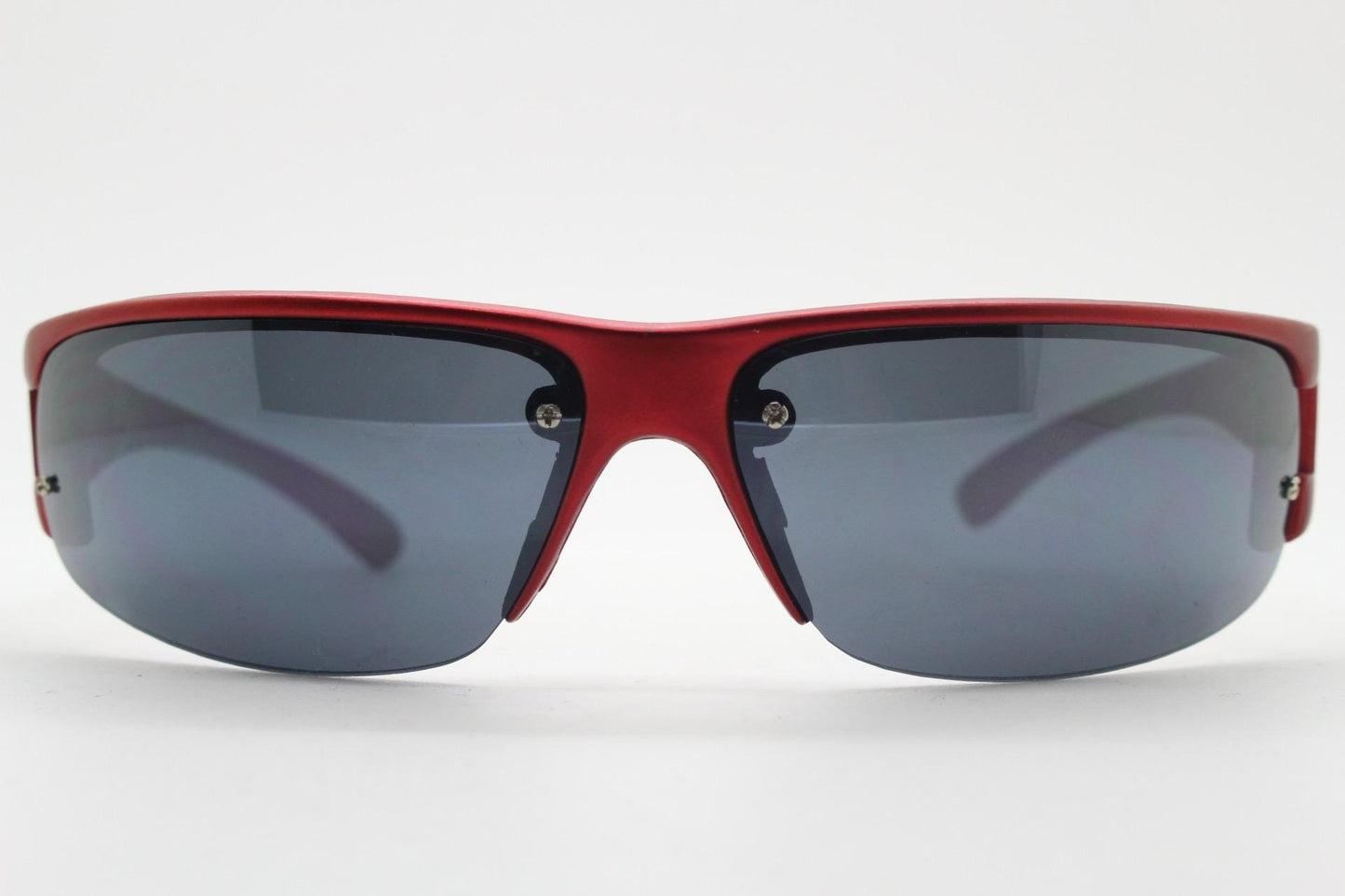 90s vintage visor sunglasses. Red matt metallic curved half frame wrap around sports shield with dark lenses. Mini mask. 2000's. Y2K NOS