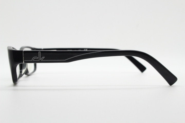 Calvin Klein rectangular glasses model 5714. Black gloss low profile acetate optical frames. Prescription eyeglasses. RX vintage spectacles