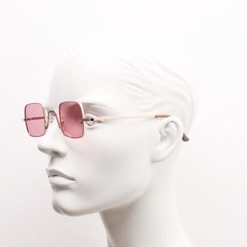 Y2K vintage small square sunglasses. Womens imposing minimal gold metal frame with pink lenses. Steampunk. Cosplay. Unused 2000s NOS