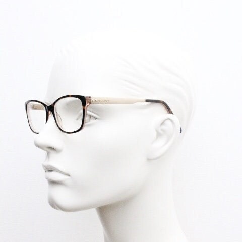 Gant vintage modified cat eye glasses model 4060. Tortoise acetate and satin metal arm cateye optical frames. Womens prescription spectacles