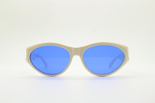 Benson and Ashley vintage 80s cat eye sunglasses hand made in England. 50s design white acetate cateye frame with cobalt blue lenses. NOS