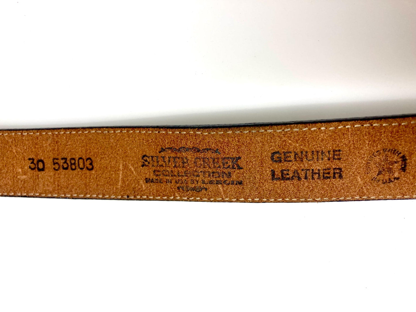 Leegin 80s vintage Silver Creek Collection Native American belt. Leather cutout overlay on tapestry backing. Changeable buckle. USA made NOS