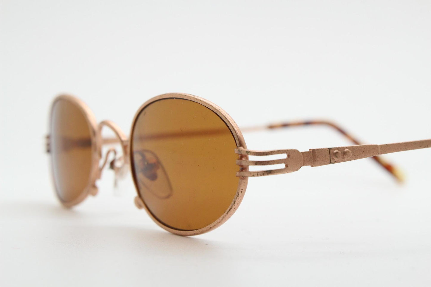 90s oval vintage metal sunglasses. Minimal small satin finish gold metal micro frame with brown lenses. Steampunk. Unused NOS