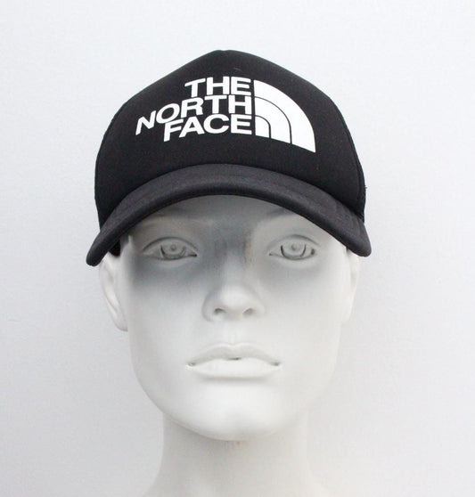The North Face plain black baseball cap with big white spell out logo. Classic trucker style hat with fully adjustable back