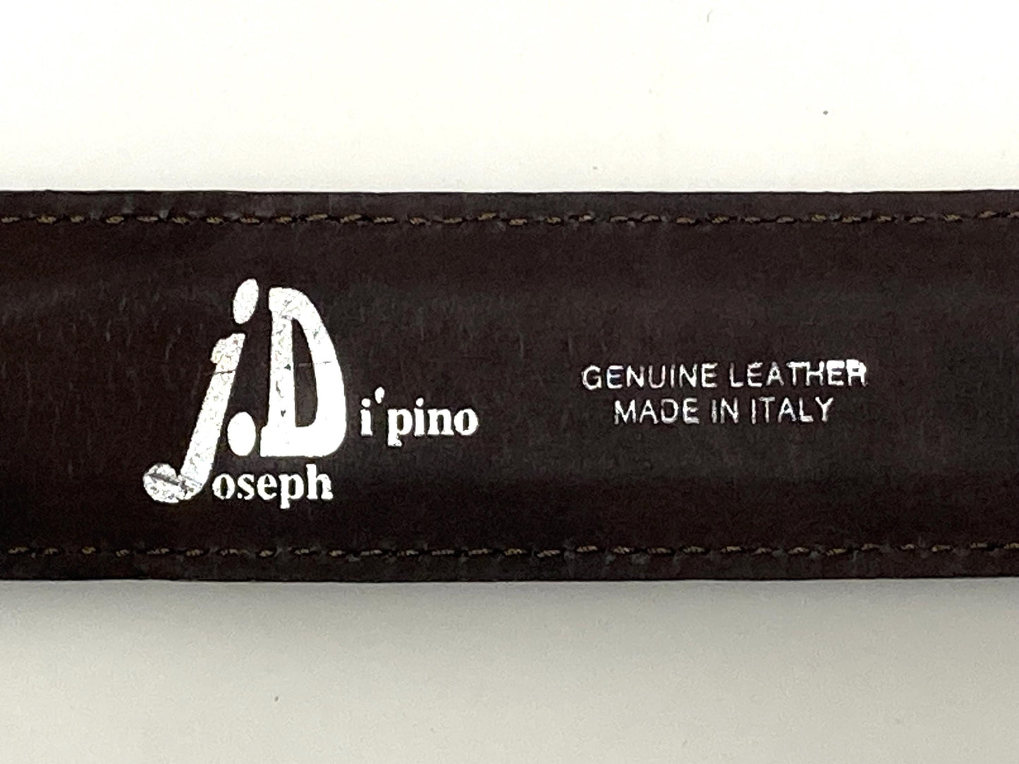 90s vintage dark brown genuine leather belt made in Italy by Joseph Di Pino. Tooled finish made to look like Ostrich. NOS. Mens Large