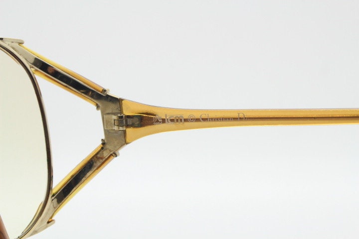 Christian Dior 70s vintage round eyeglasses model 2524 made in Germany from Optyl. Transparent brown optical frame. Prescription eyeglasses