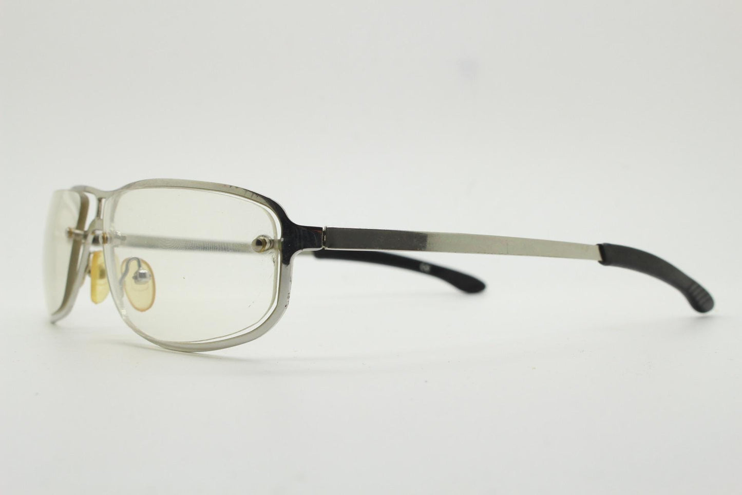 Y2K vintage rectangular aviator sunglasses. Aerodynamic racing style chrome frame  with slight mirror glazed clear lens. 2000's bug eye