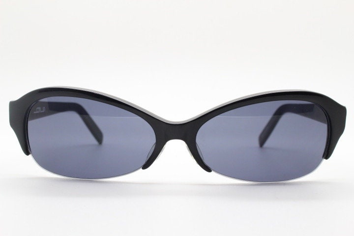 Stylised vintage oval praying mantis cateye sunglasses made in Japan. Superior Japanese black gloss acetate half frame bug eye