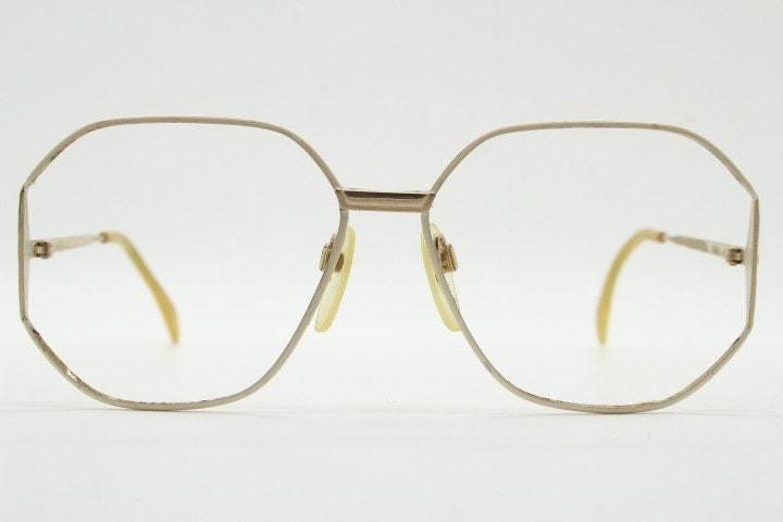 Silhouette 70s vintage octagon eye glasses. Womens sophisticated angular golden optical frame with white detail. Prescription eyeglasses. Rx
