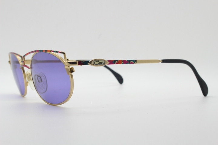 Cazal 90s vintage sunglasses made in Germany. Dynamic multi colour enamelled frame with custom ordered unique purple lenses
