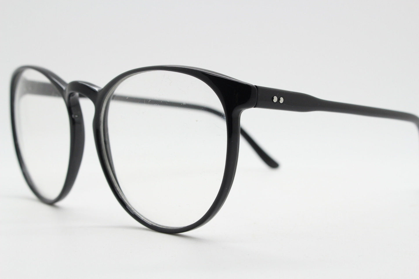 80s vintage black round glasses. Slightly oversized slim optical frames. Prescription eyeglasses with clear lens. RX spectacles