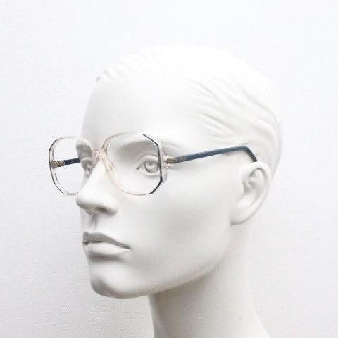 Silhouette 80s vintage hexagon eye glasses made in Austria. Transparent crystal optical frame with abstract blue pattern. Prescription. 70s