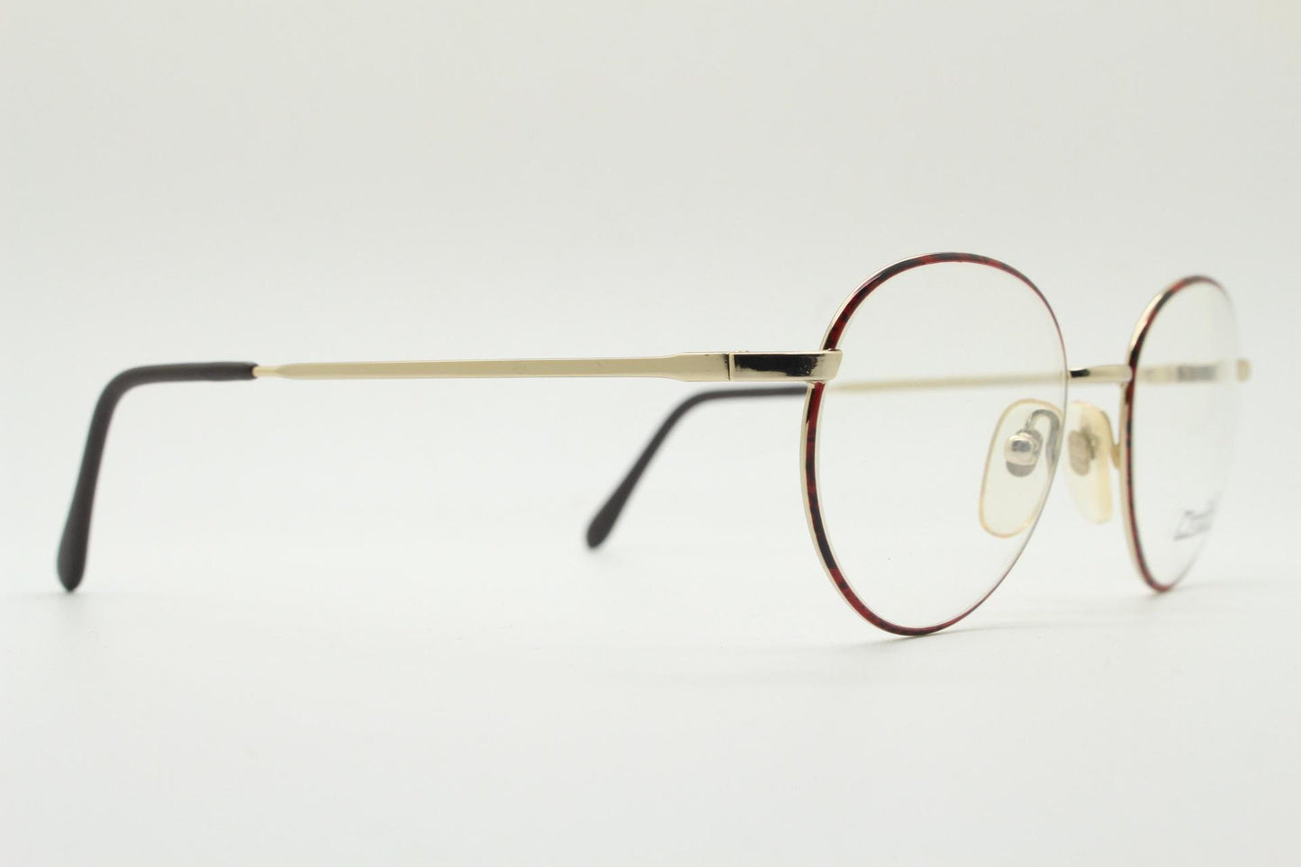 Marcolin 90s vintage round metal eye glasses made in Italy. Panto shape optical frames with attractive red and black front. Prescription RX