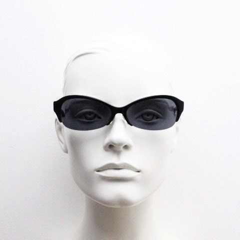Stylised vintage oval praying mantis cateye sunglasses made in Japan. Superior Japanese black gloss acetate half frame bug eye