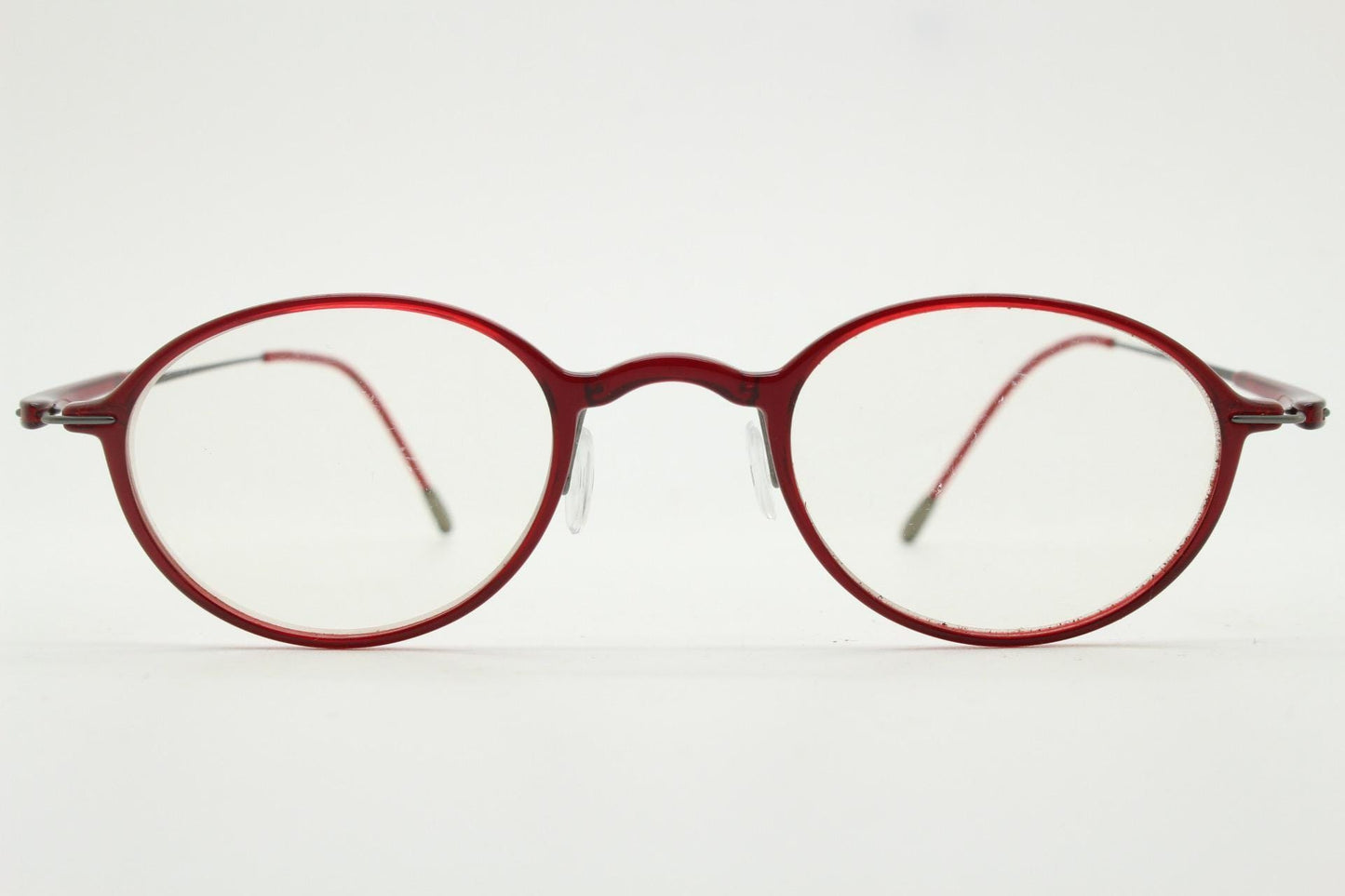 Silhouette rectangular frameless eye glasses made in Austria. Lightweight 1930s design with titanium. Red optical frame. Prescription RX