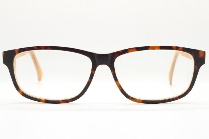 Cheap Monday rectangular low profile eye glasses. Brown and amber layered acetate optical frames. Prescription eyeglasses. RX spectacles