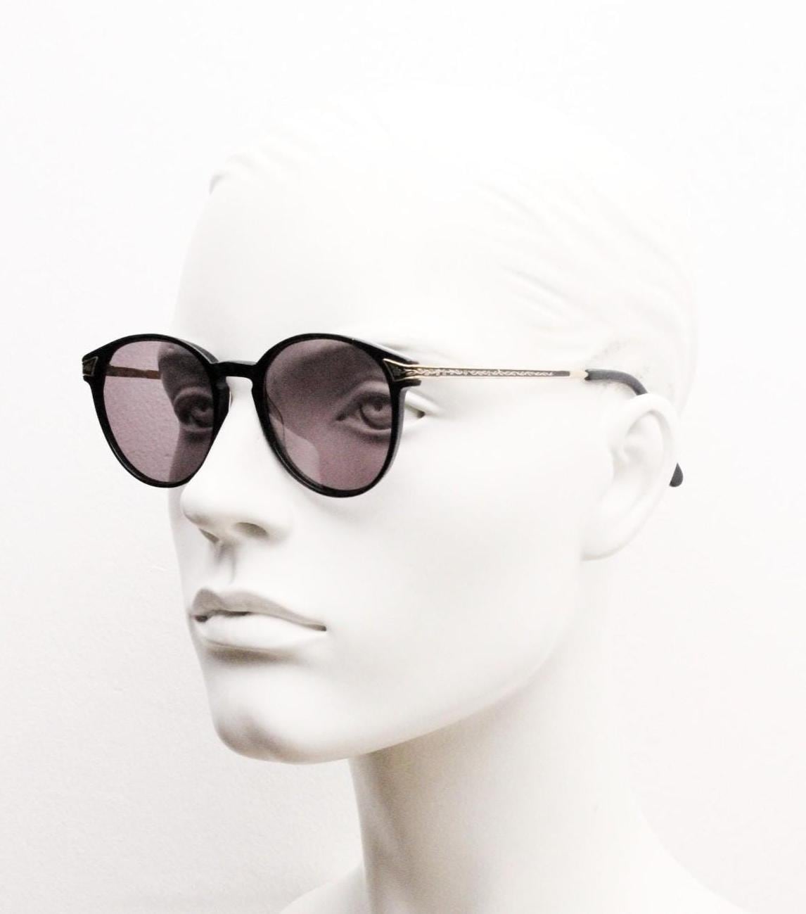 Laura Ashley 90s vintage round sunglasses. Refined 1940s design in black acetate with ornate embossed metal arm details. Unused NOS