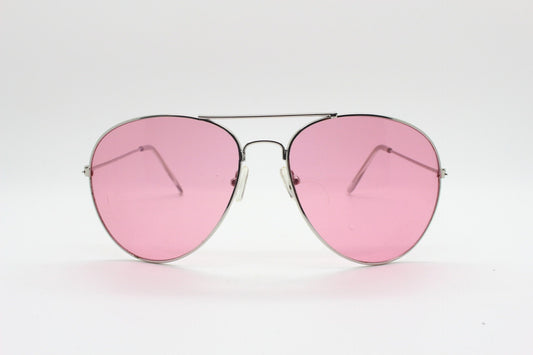 Y2K vintage oversized aviator sunglasses. Silver metal frame aviators with big light tone pink lenses. Teardrop. 70s. 2000s. 00s