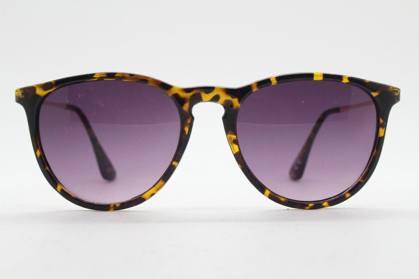 90s vintage sunglasses. Tortoise gloss frame with graduating black lenses and contrasting gold arms. Unused NOS