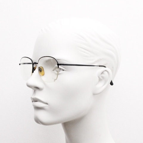 Giorgio Armani round eye glasses made in Italy. Minimal black satin finish half frame spectacles. Prescription optical eyeglasses. RX