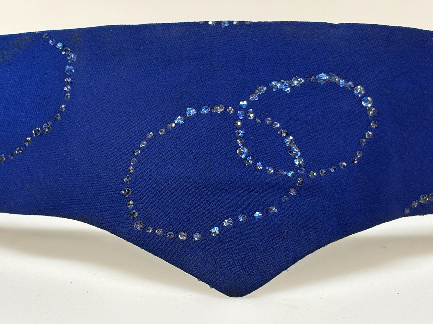80s vintage womens hand made feature belt for a dress. Flattering V shape. Blue fabric with abstract glitter circles on a leather backing