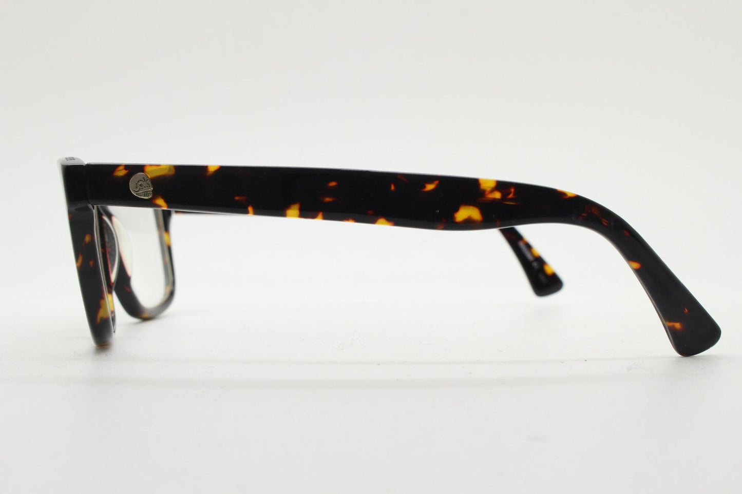 Cheap Monday rectangular low profile eye glasses. Dark brown tortoise gloss finish acetate optical frames. Prescription RX spectacles